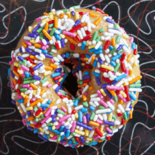 Pony Party - Strawberry glaze and rainbow sprinkles donut.
